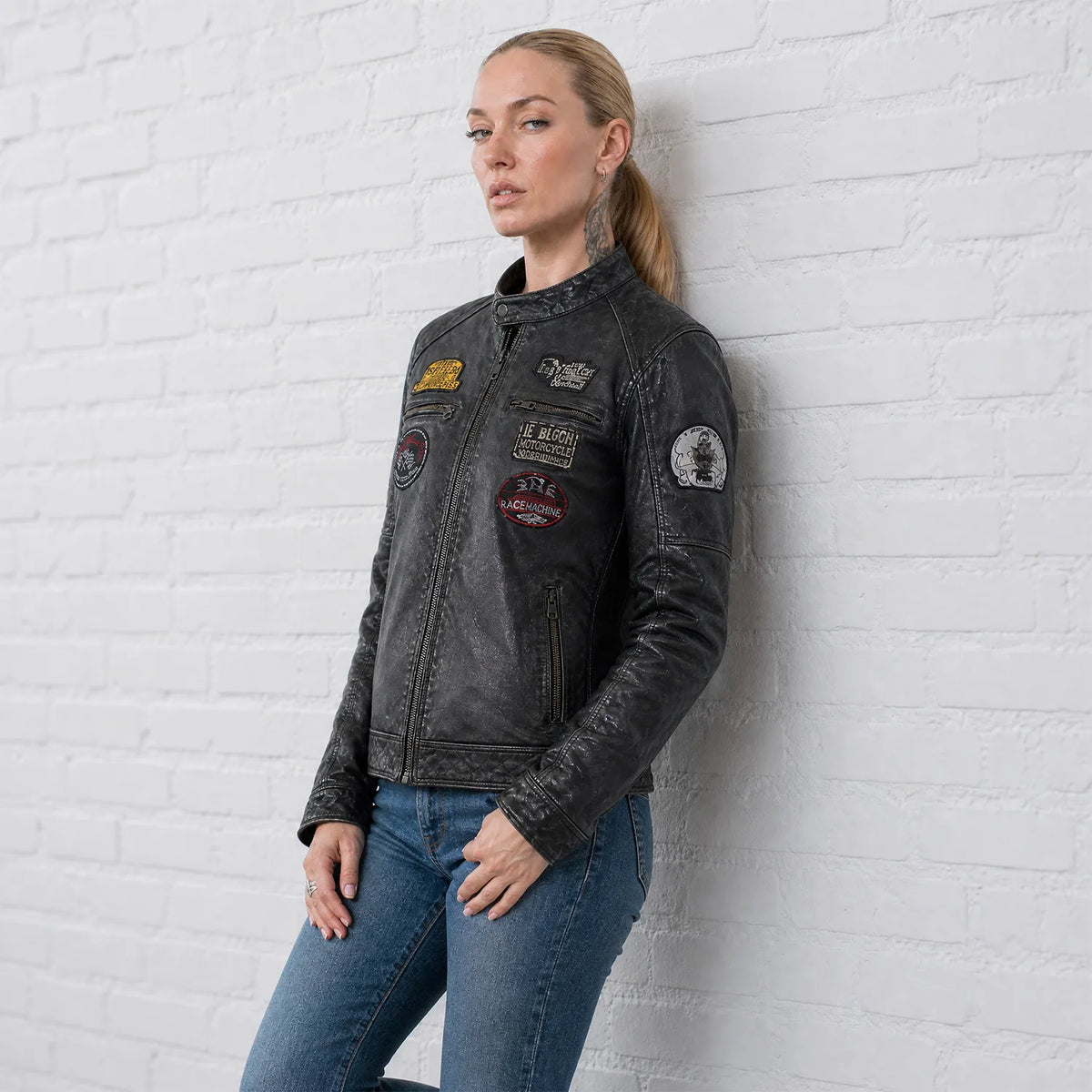 Women’s Distressed Black Leather Café Racer Jacket with Vintage Motorcycle Patches