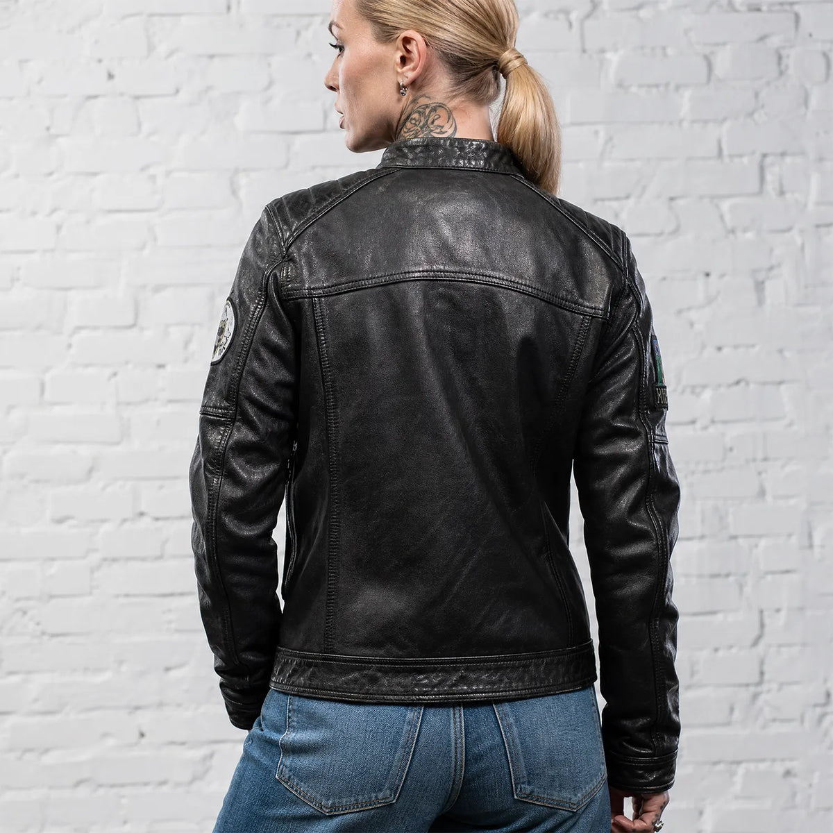 Women’s Distressed Black Leather Café Racer Jacket with Vintage Motorcycle Patches